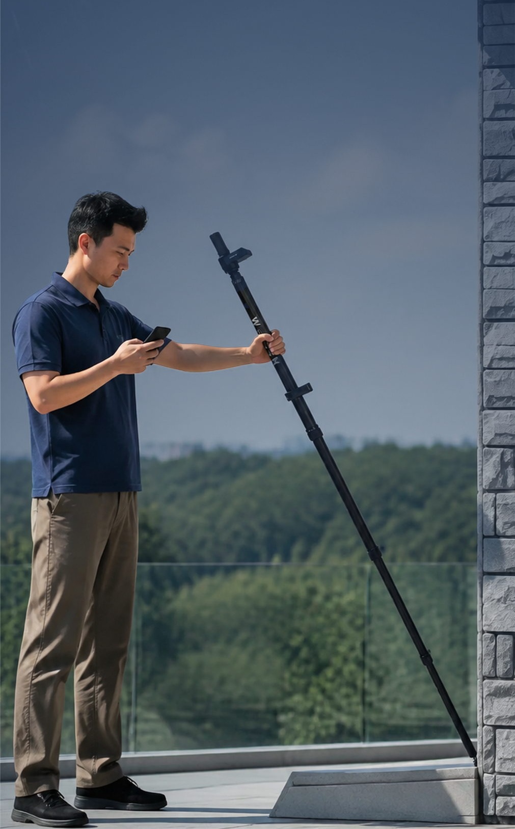 Surveyor using LiteSurvey 2 Pro in the field